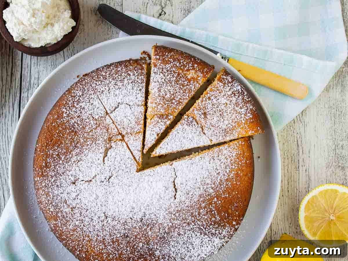 Lemon Ricotta Cake Recipe - Zesty Italian Dessert 4 Overhead view of a cake with three wedges cut and slightly moved out from the cake.