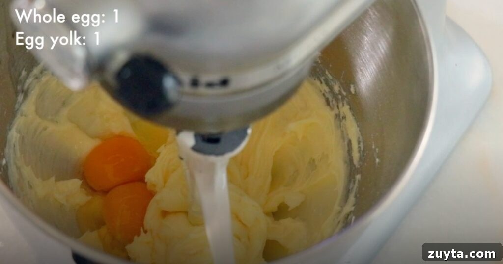 Slice-and-Bake Icebox Cookies Recipe 5 adding eggs in butter to make cookie dough