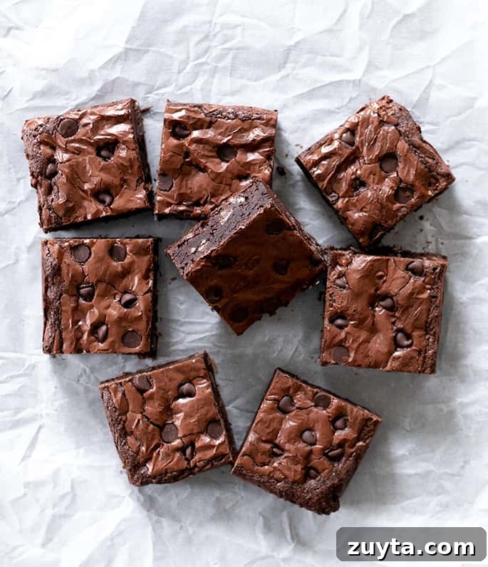 Irresistible Gluten-Free Chocolate Recipes for Every Craving 9 Overhead image of sliced brownies with one on its side