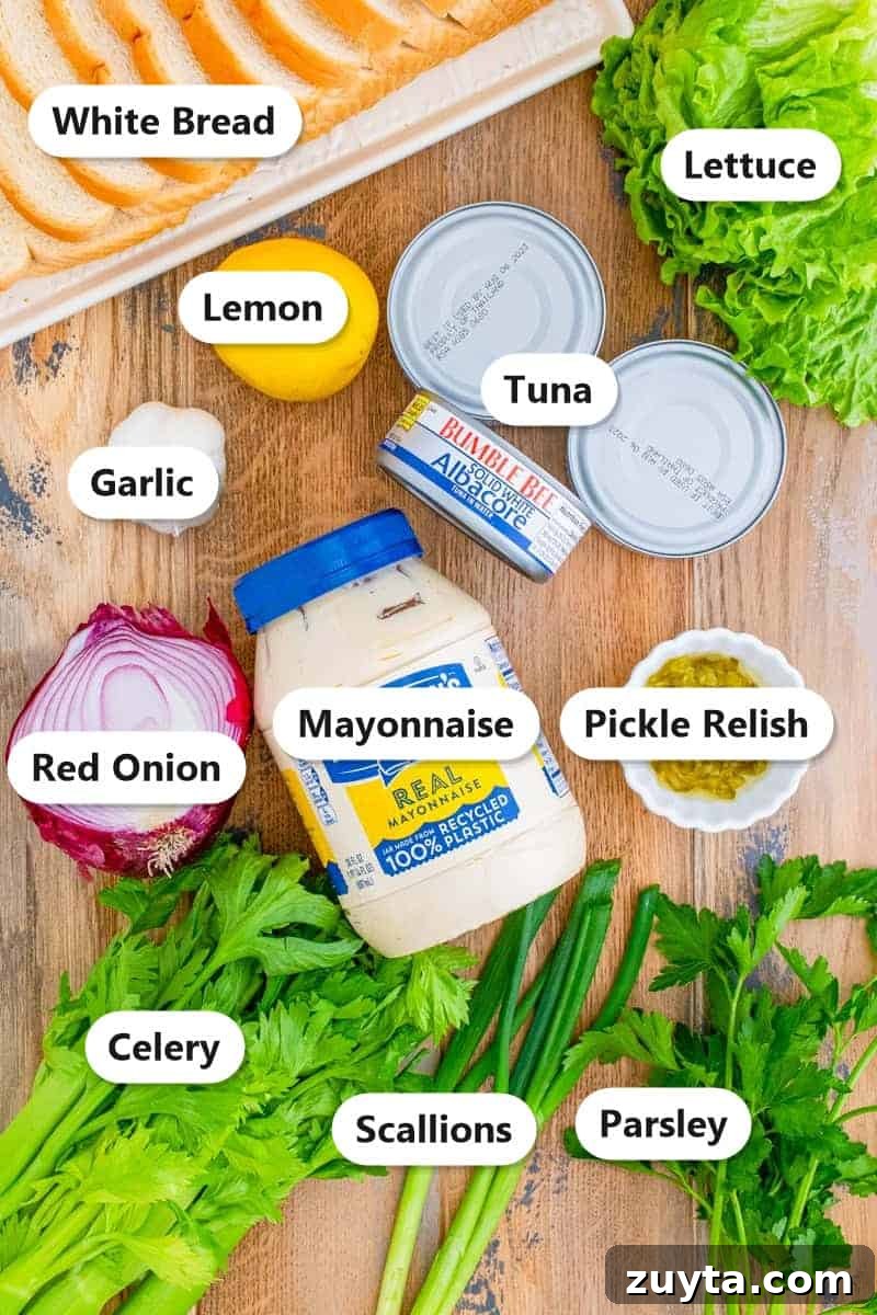 How to Make a Classic Tuna Salad Sandwich 2 Labeled ingredients for tuna salad sandwiches including canned tuna, mayonnaise, celery, red onion, pickle relish, and herbs.