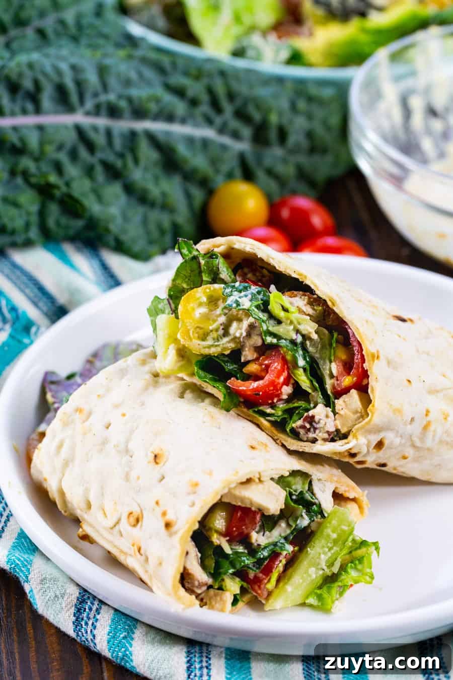 Vegan Kale Caesar Roll-Ups Recipe 3 Vegan Kale Caesar Roll-Up on a plate.