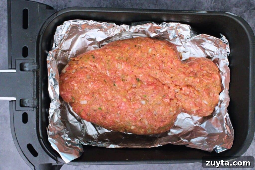 place mummy meatloaf in air fryer basket