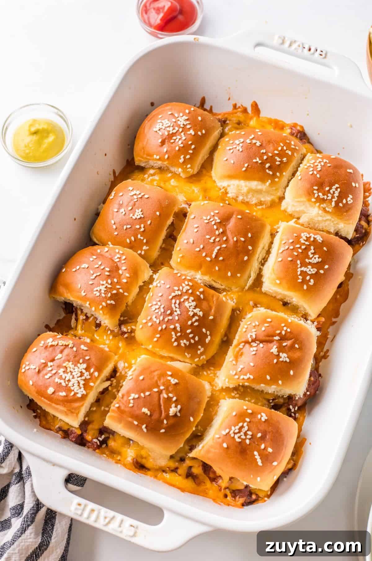Sloppy Joe Sliders Recipe for Game Day and Parties 7 Baked sloppy joe sliders in a casserole pan.