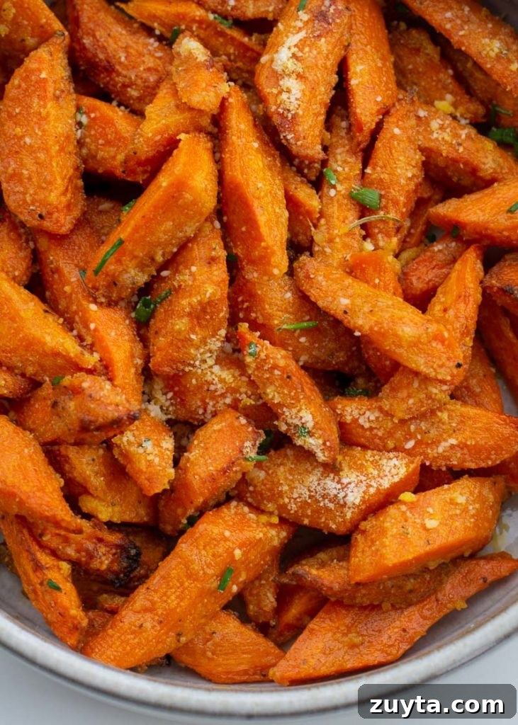 Crispy Air Fryer Carrots Recipe 9 These Air Fryer Carrots are tossed in olive oil, parmesan and spices! These roasted carrots are perfectly tender on the inside and crisp on the outside.