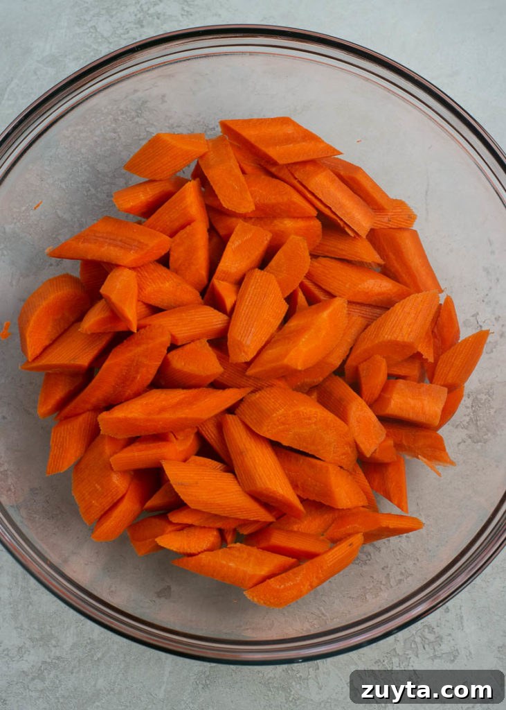 Crispy Air Fryer Carrots Recipe 5 These Air Fryer Carrots are tossed in olive oil, parmesan and spices! These roasted carrots are perfectly tender on the inside and crisp on the outside.