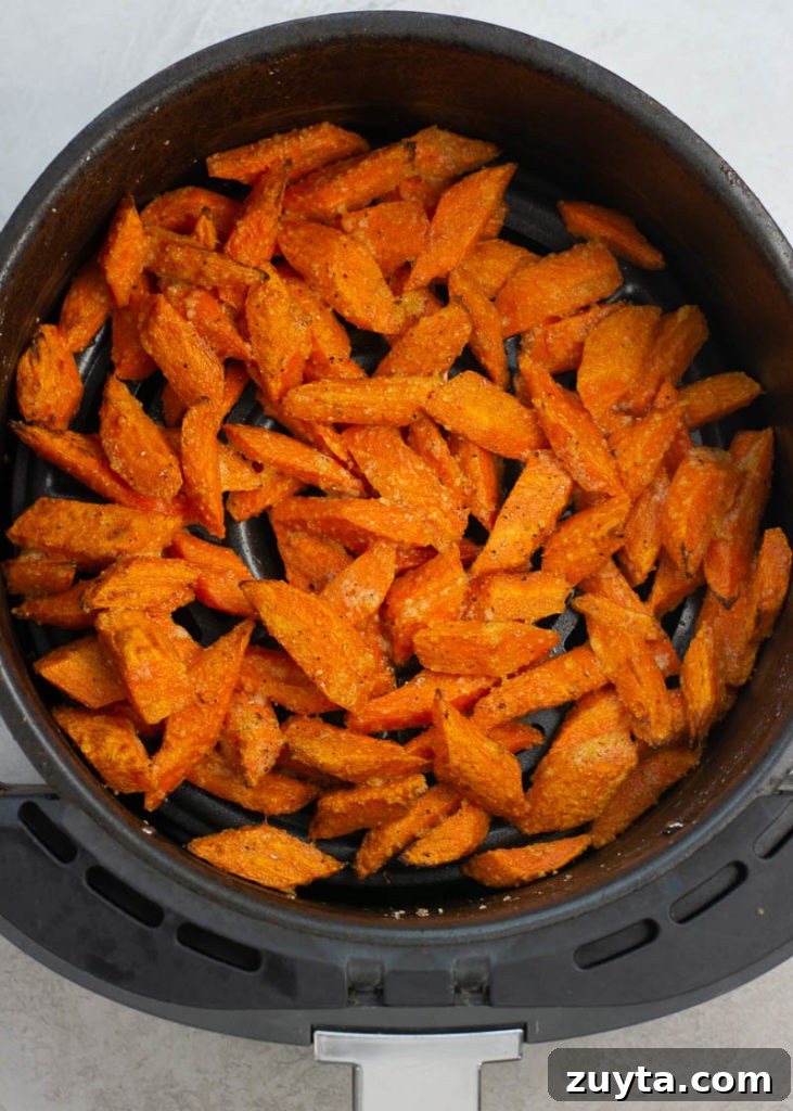 Crispy Air Fryer Carrots Recipe 8 These Air Fryer Carrots are tossed in olive oil, parmesan and spices! These roasted carrots are perfectly tender on the inside and crisp on the outside.