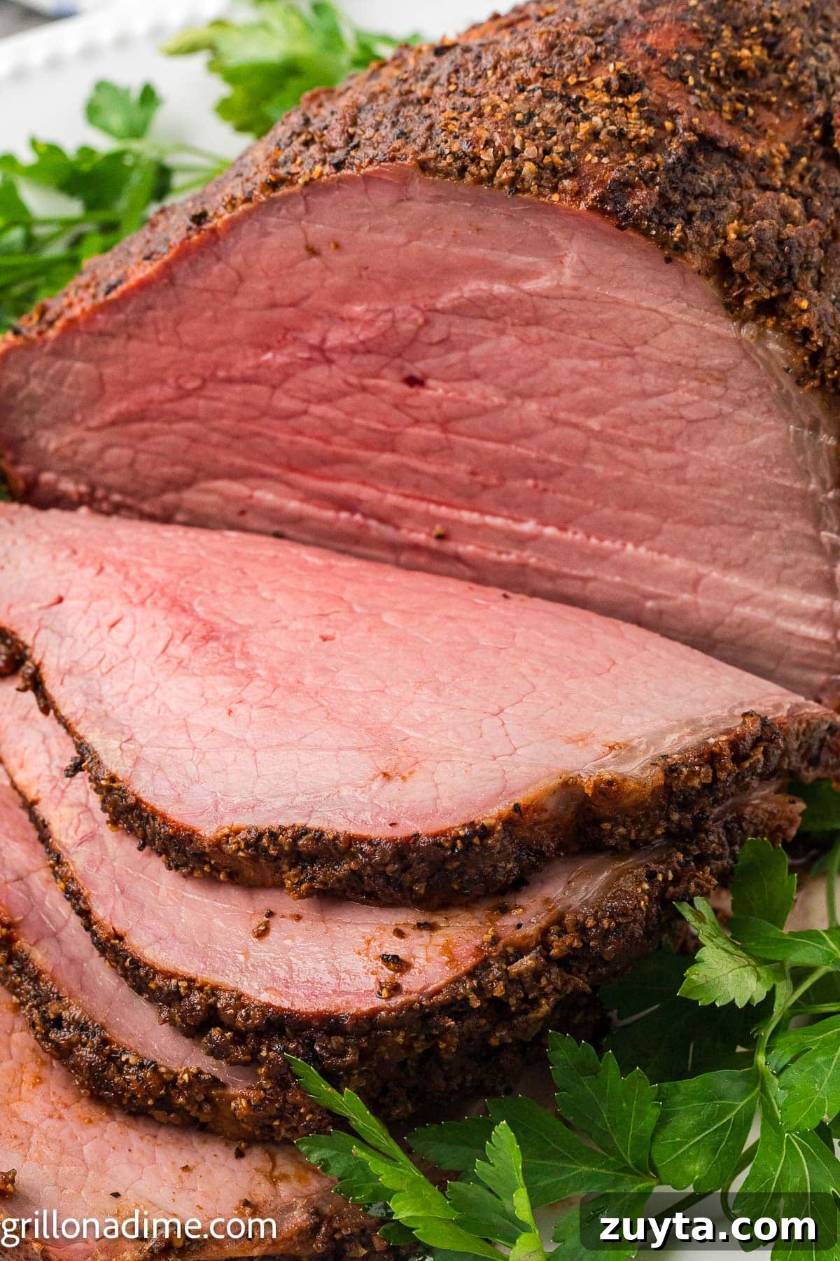 Sliced smoked eye of round on a platter