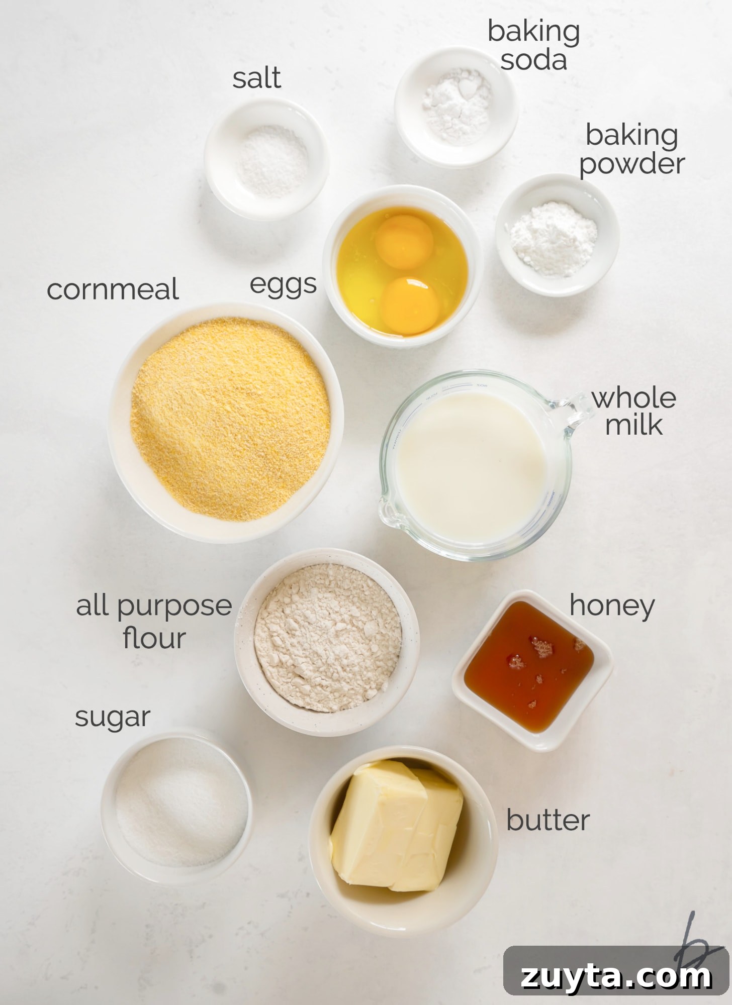 20-Minute Cornbread Muffins Recipe 2 cornbread muffin ingredients in bowls labeled with text