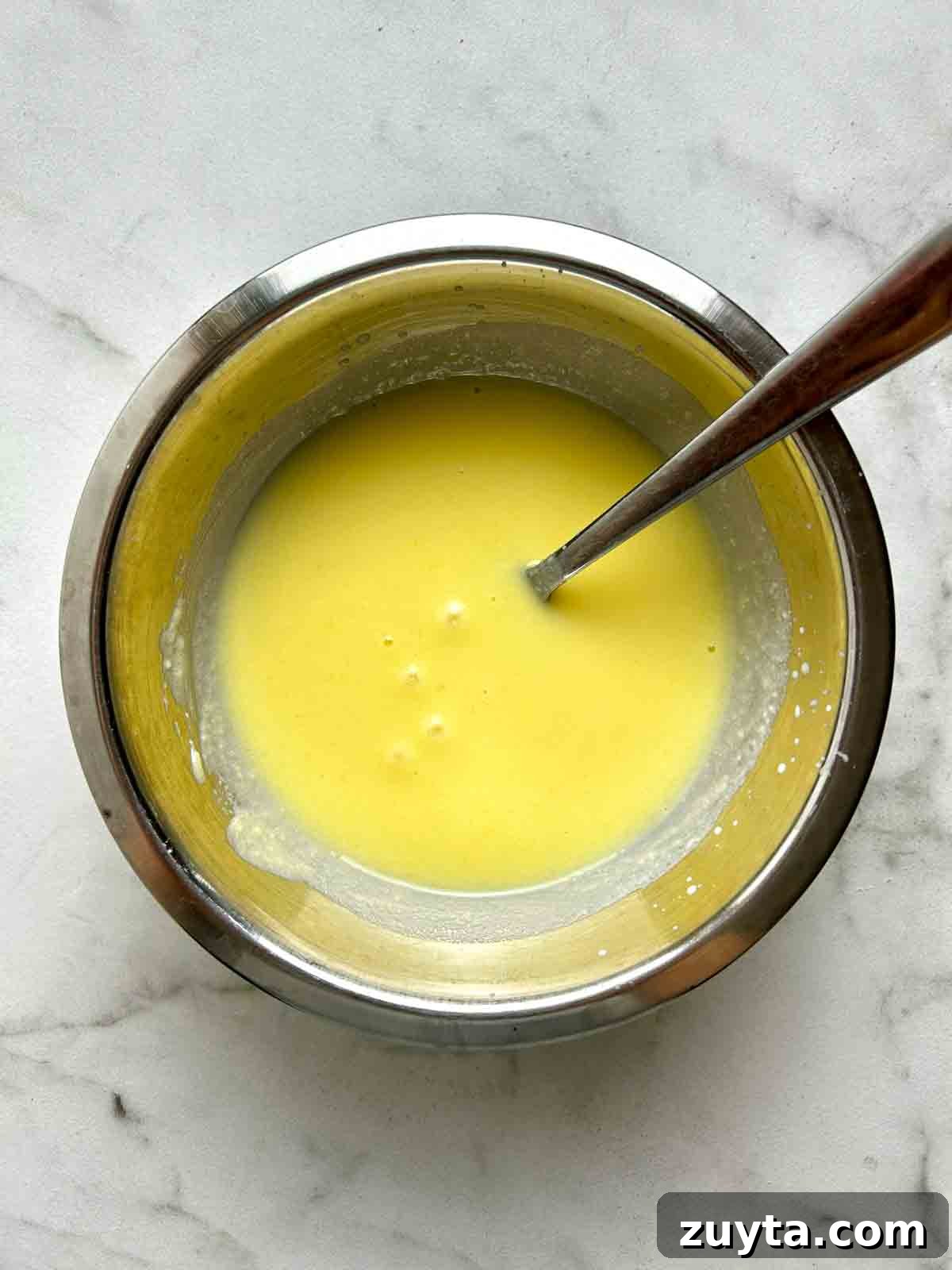 Snickers Salad Recipe: Creamy No-Bake Dessert with Apples 5 vanilla pudding mixed with milk.