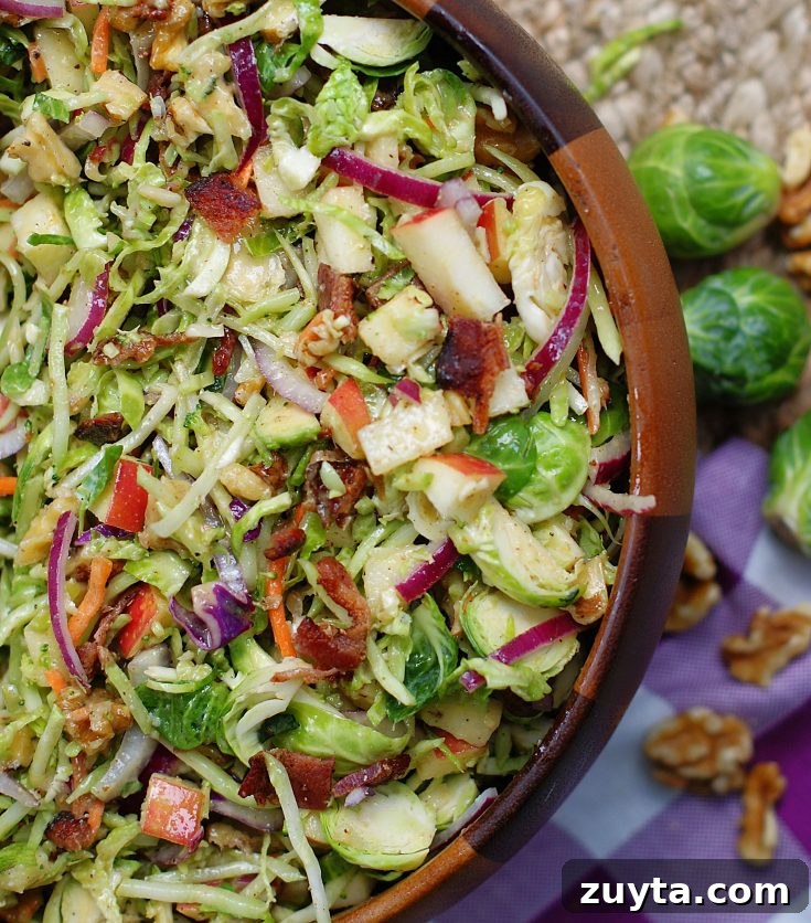 A close up of the broccoli slaw with apples and brussel sprouts