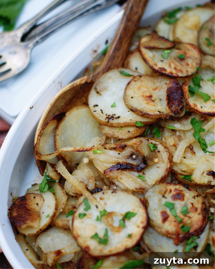 Lyonnaise Potatoes upclose in a serving dish
