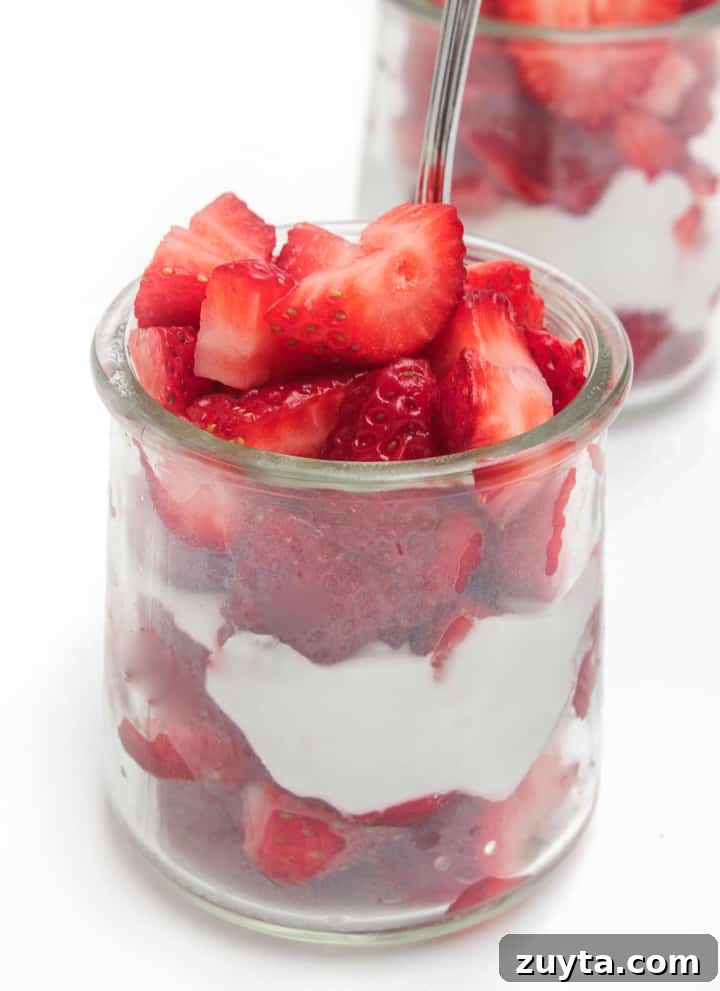 Whipped coconut cream with strawberries parfait