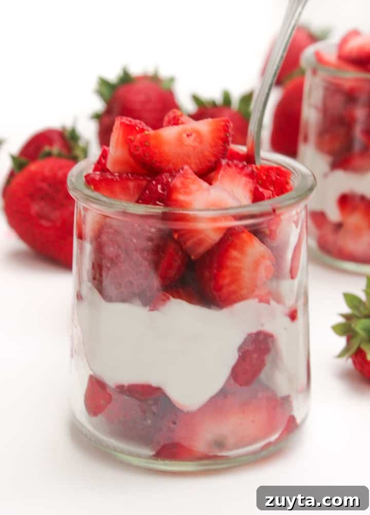 Whipped coconut cream with fresh strawberries parfait