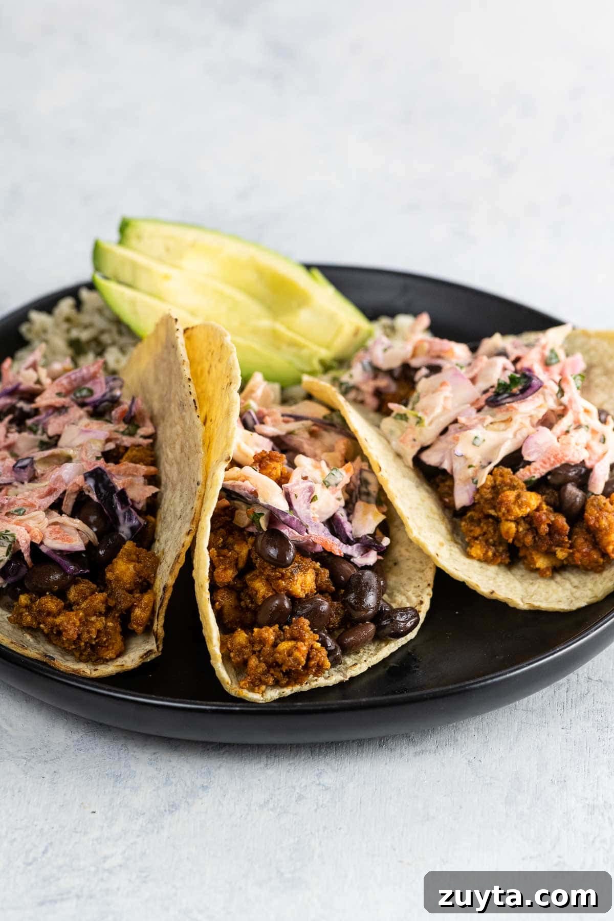 Sofritas Tofu Taco Filling Recipe 2 three sofritas tacos on a plate