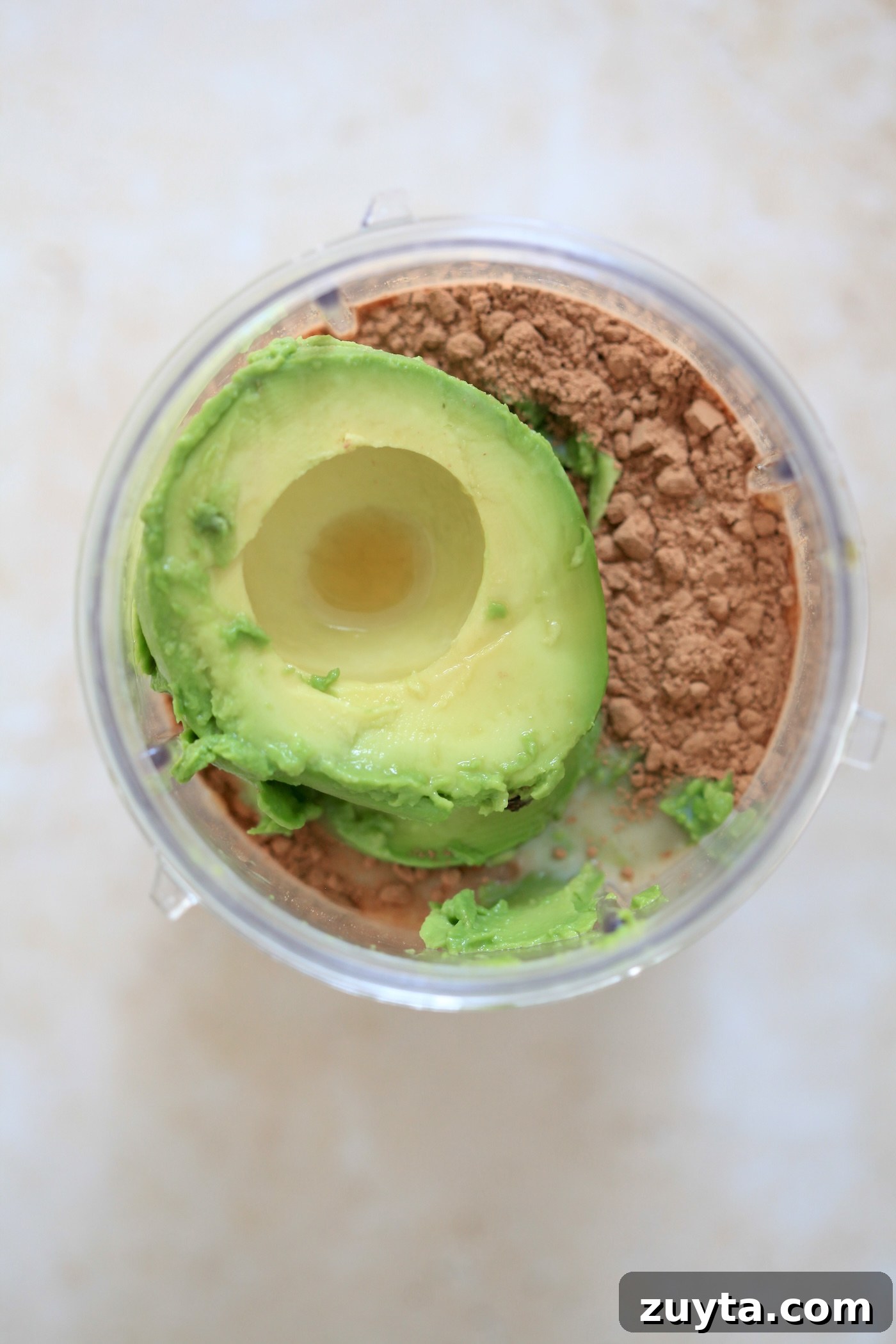 Creamy Dairy-Free Chocolate Avocado Ice Cream Recipe 2 avocado and cocoa powder in blender