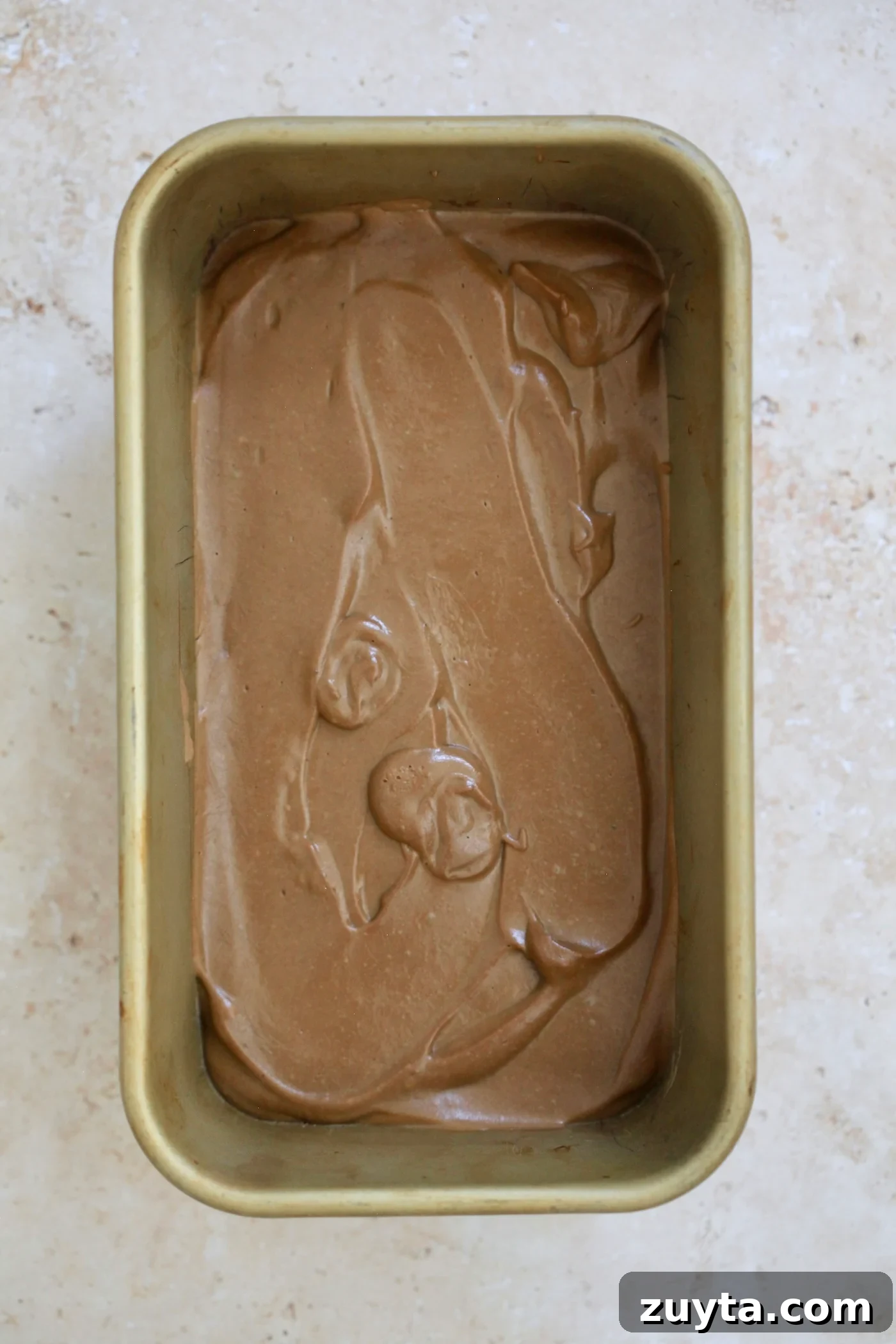 Creamy Dairy-Free Chocolate Avocado Ice Cream Recipe 5 loaf pan of frozen chocolate mixture