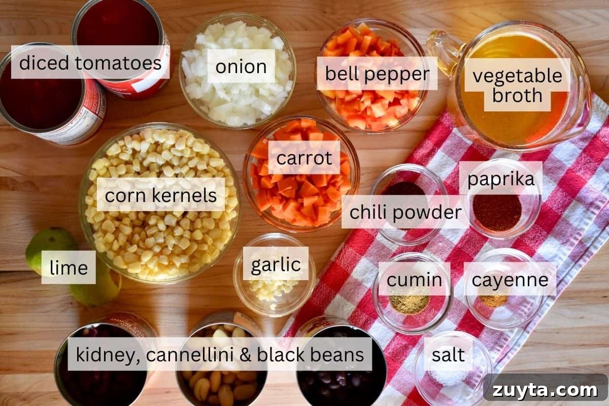 Slow Cooker Three-Bean Vegetarian Chili Recipe 4 Ingredients for recipe including onions, carrots, canned tomatoes, corn, and seasonings.