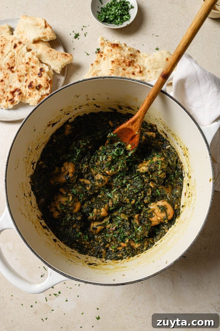 Creamy Chicken Saag with Spinach 7 Palak Chicken in a pot ready to be served