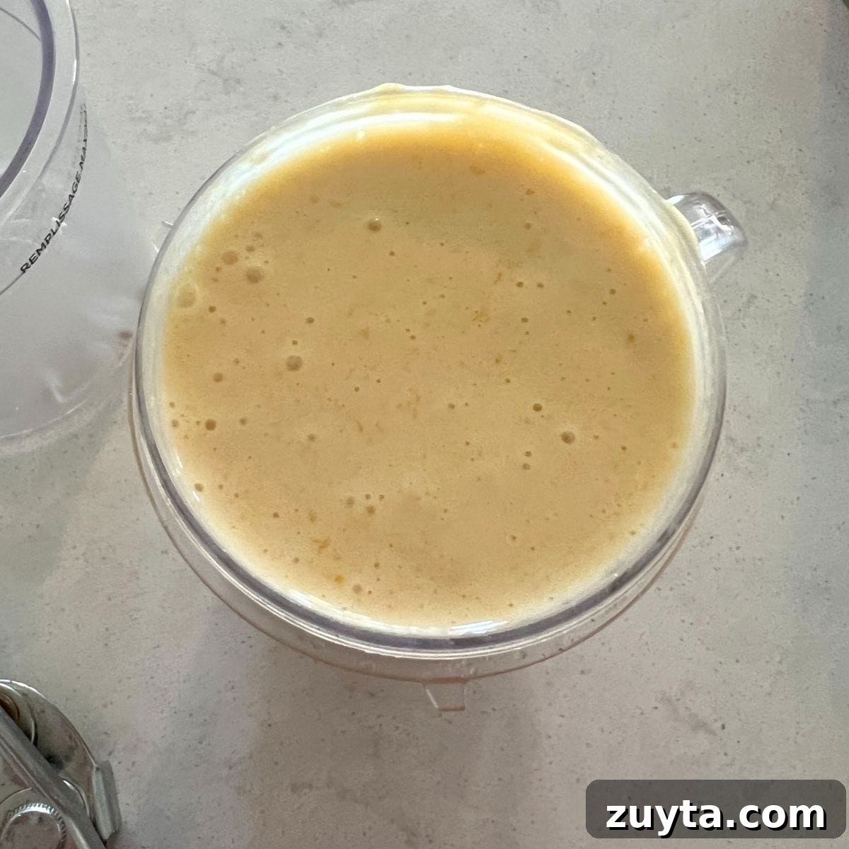 Ninja Creami Peaches and Cream Dairy-Free Recipe 2 Blended canned peaches for Ninja Creami ice cream