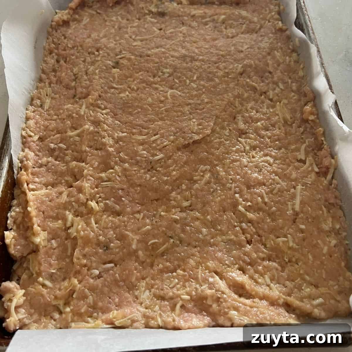Zero-Carb Carnivore Pizza Crust Recipe 3 Carnivore pizza crust shaped out on a pan.