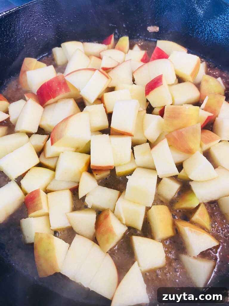 Apple Bourbon Glazed Pork Chops Recipe 6 adding apples to sauce before cooking