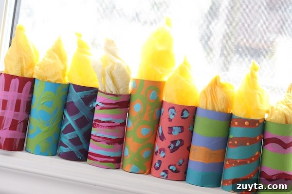 How to Make a Menorah from Toilet Paper Rolls 9 painted cardboard roll menorah on windowsill