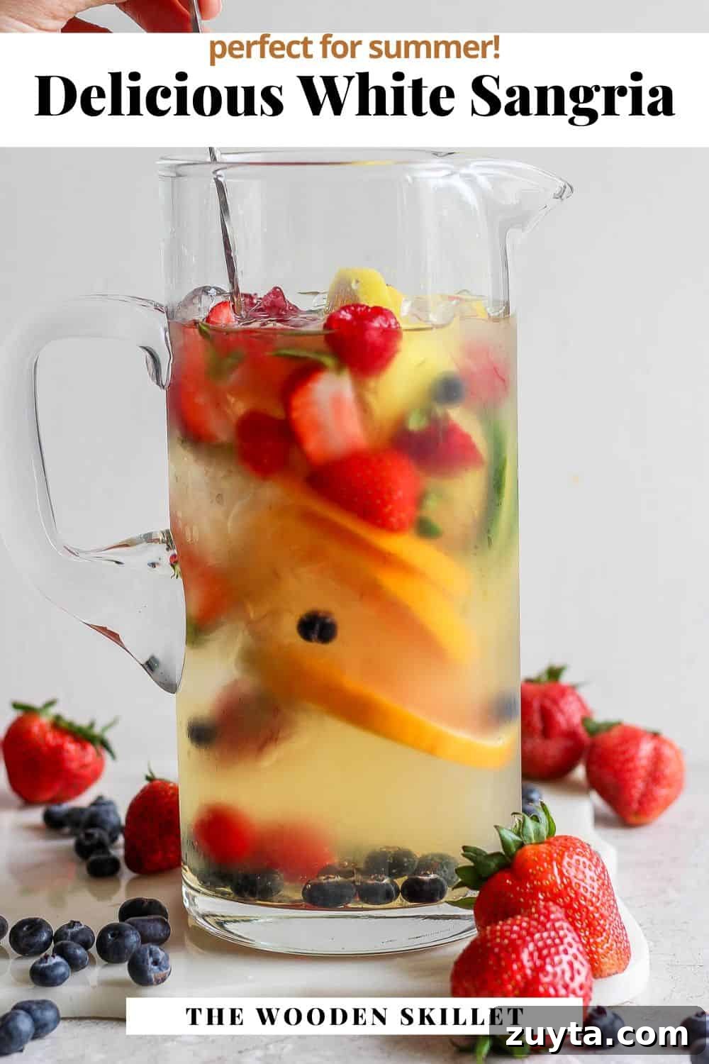 White Sangria Recipe with Citrus and Fresh Berries 8 Pinterest image for white sangria.