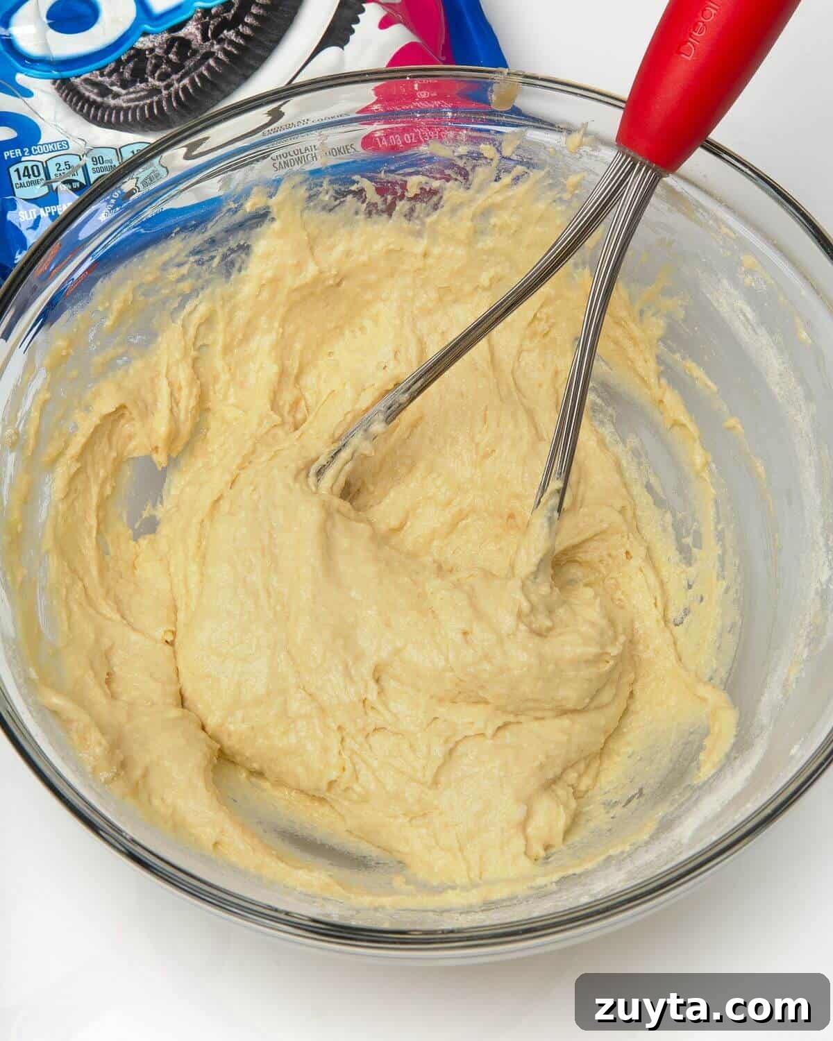 Air Fryer Oreos Recipe: Crispy, Gooey Dessert 6 air fried oreo batter mixed in glass bowl with whisk