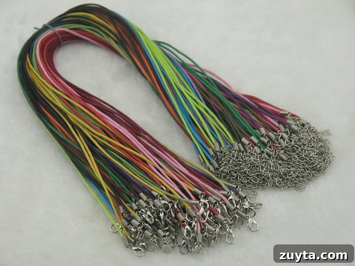 How to Make an Essential Oil Diffuser Necklace 4 a bundle of cotton wax necklaces in bright colors from pink to blue, green, orange, and brown