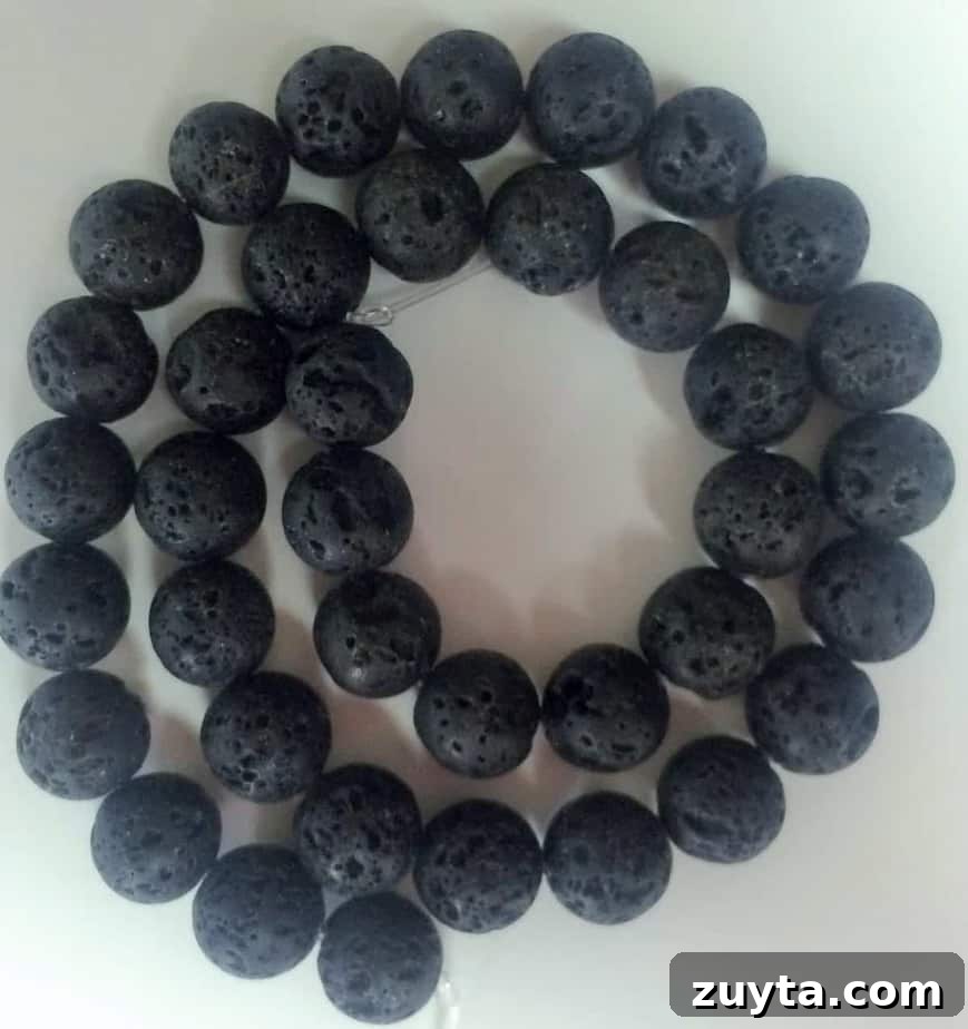 How to Make an Essential Oil Diffuser Necklace 5 a string of black lava beads used to release the scent of essential oils in diffuser jewelry