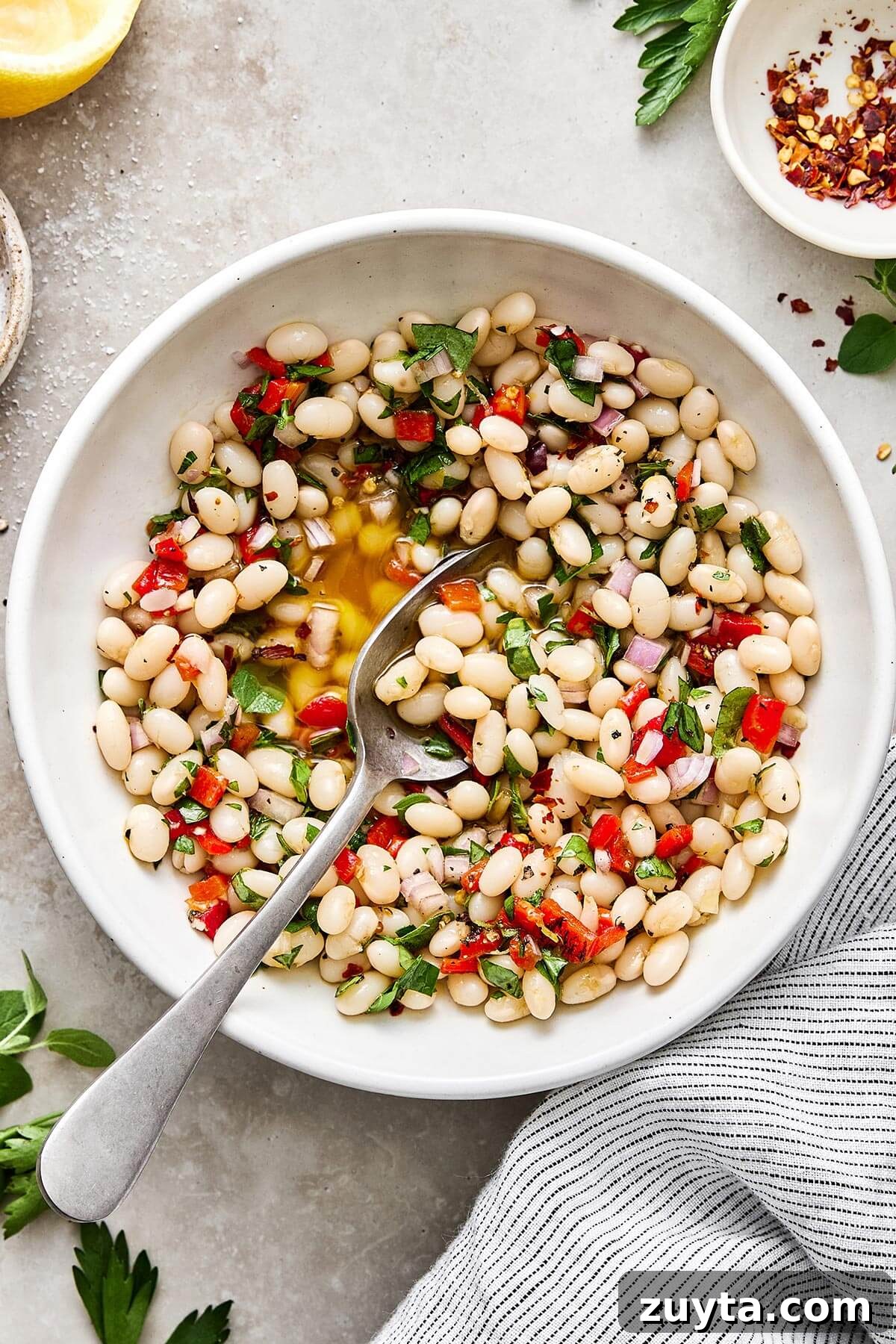 Over 60 Mediterranean Diet Recipes for Every Meal 27 Marinated white beans in a bowl.