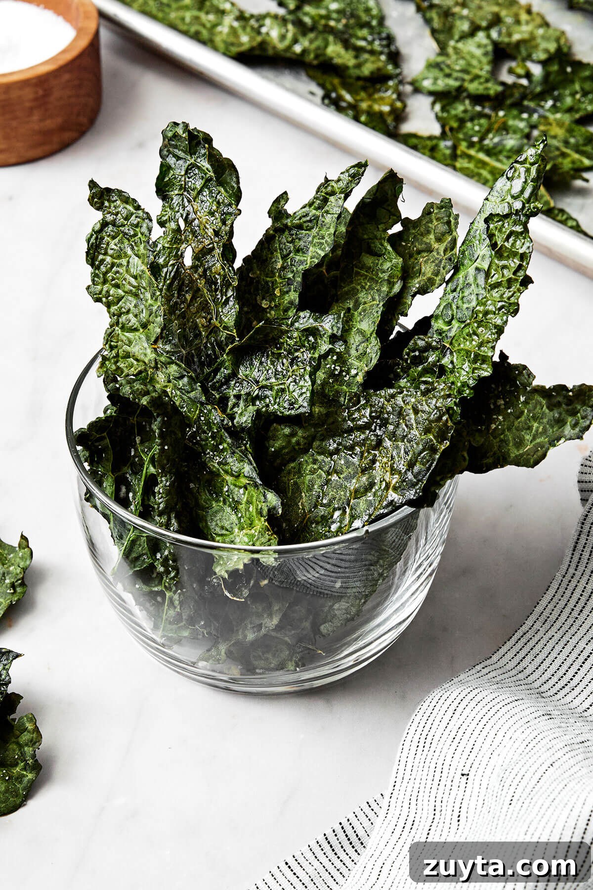Over 60 Mediterranean Diet Recipes for Every Meal 31 A bowl of kale chips.
