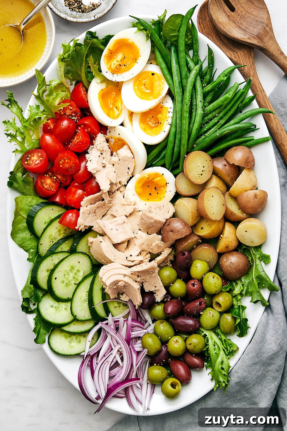 Over 60 Mediterranean Diet Recipes for Every Meal 36 A large platter of Nicoise salad