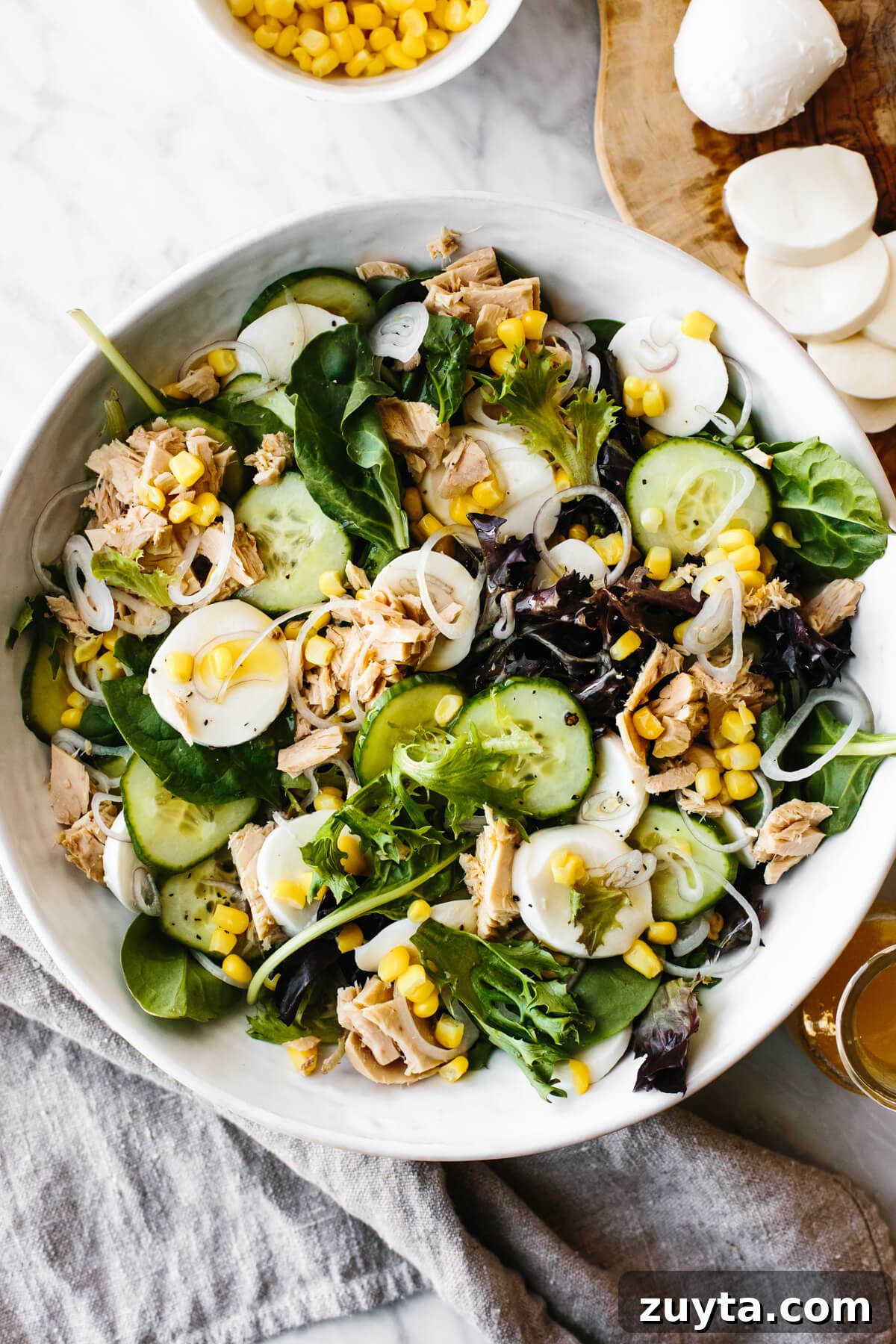 Over 60 Mediterranean Diet Recipes for Every Meal 39 Tuna, cucumber, mozzarella salad in a bowl