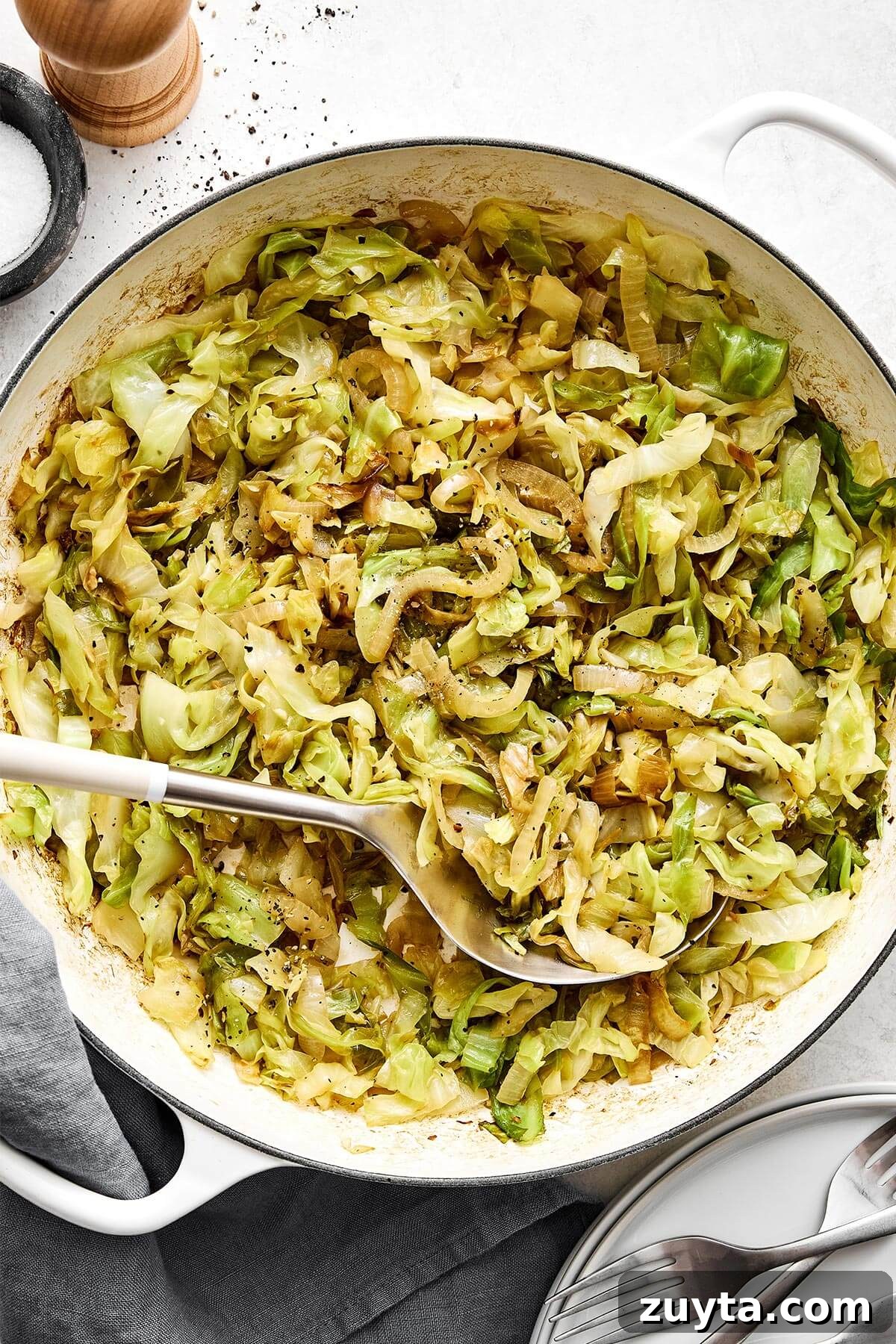 Over 60 Mediterranean Diet Recipes for Every Meal 53 A pan of sauteed cabbage.