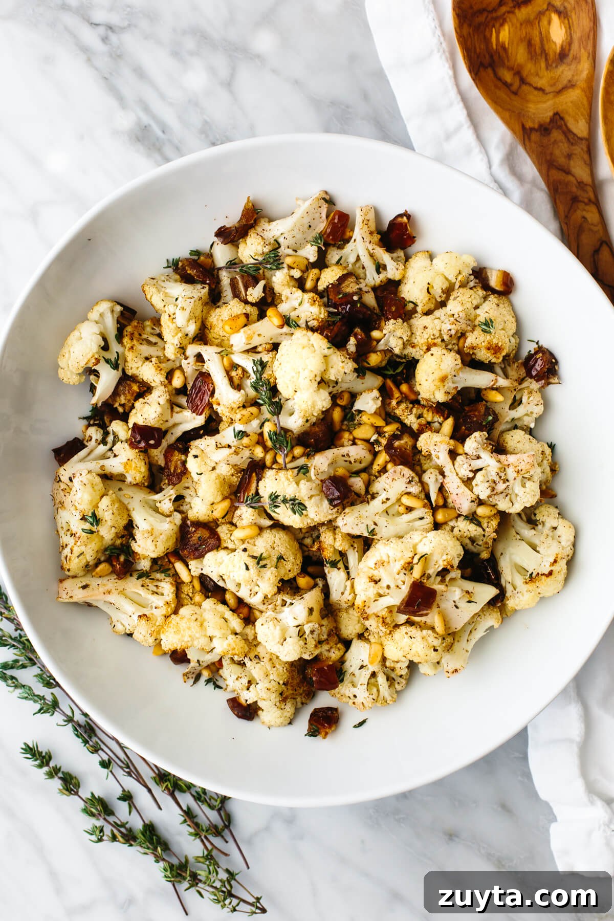 Over 60 Mediterranean Diet Recipes for Every Meal 55 Roasted cauliflower with za'atar spice in a bowl.