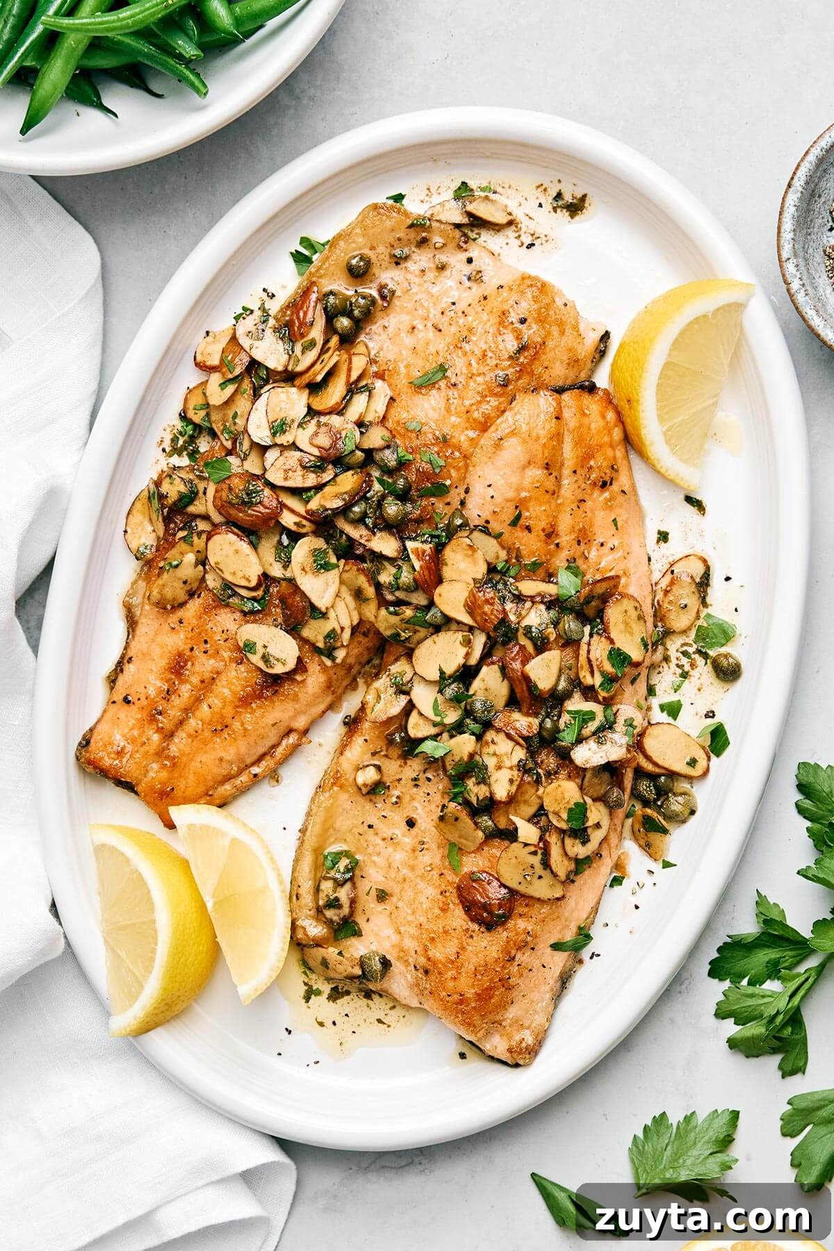 Over 60 Mediterranean Diet Recipes for Every Meal 60 A plate of rainbow trout almondine.