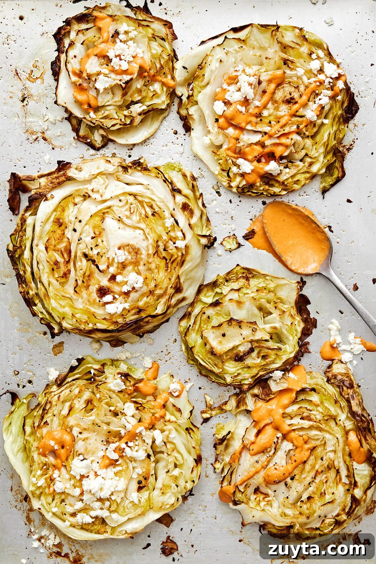 Over 60 Mediterranean Diet Recipes for Every Meal 85 Cabbage steaks with red pepper tahini sauce