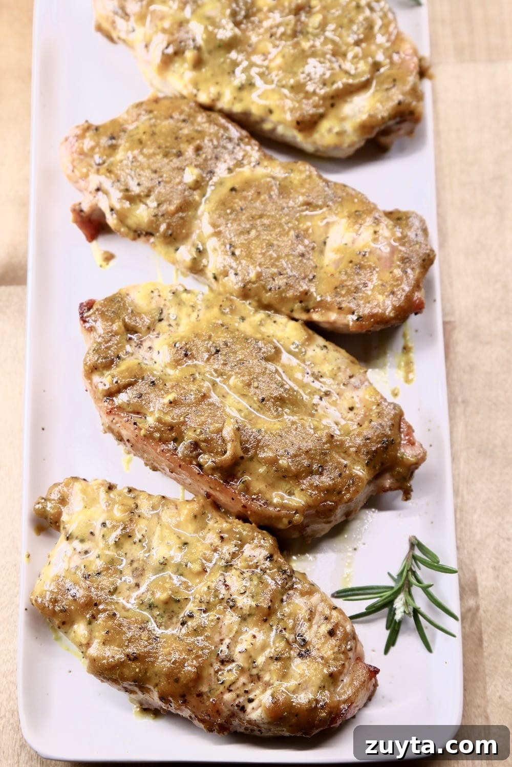 Mustard BBQ Pork Chops - easy grilling recipe Rosemary Mustard Pork Chops on a platter