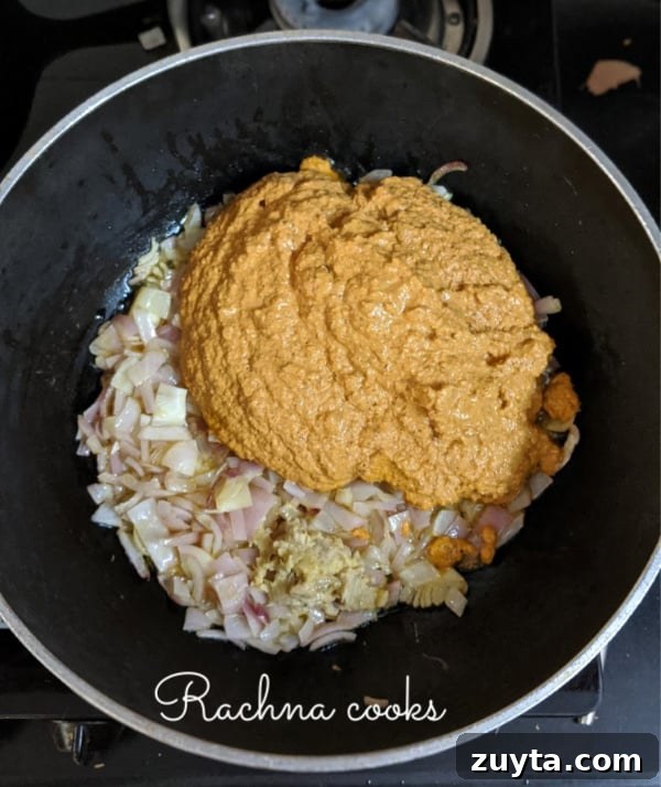 Mangalorean Prawn Gassi: Authentic Coconut Prawn Curry 6 Sauteed onions with masala paste in a pan.