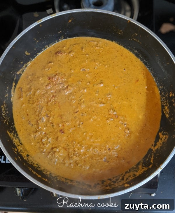 Mangalorean Prawn Gassi: Authentic Coconut Prawn Curry 7 Prawn gassi curry in a pan.