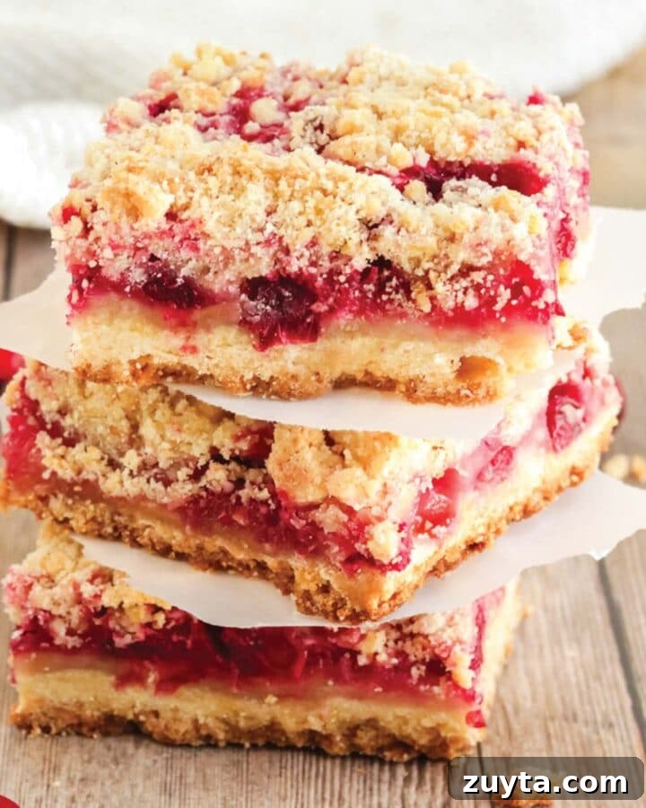 Copycat Cracker Barrel Coca-Cola Cake Recipe 10 Stack of fresh cranberry bars ready to eat.