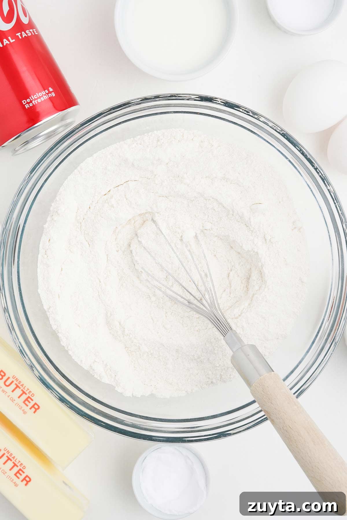 Copycat Cracker Barrel Coca-Cola Cake Recipe 5 Mixing the dry ingredients to make coca cola cake.