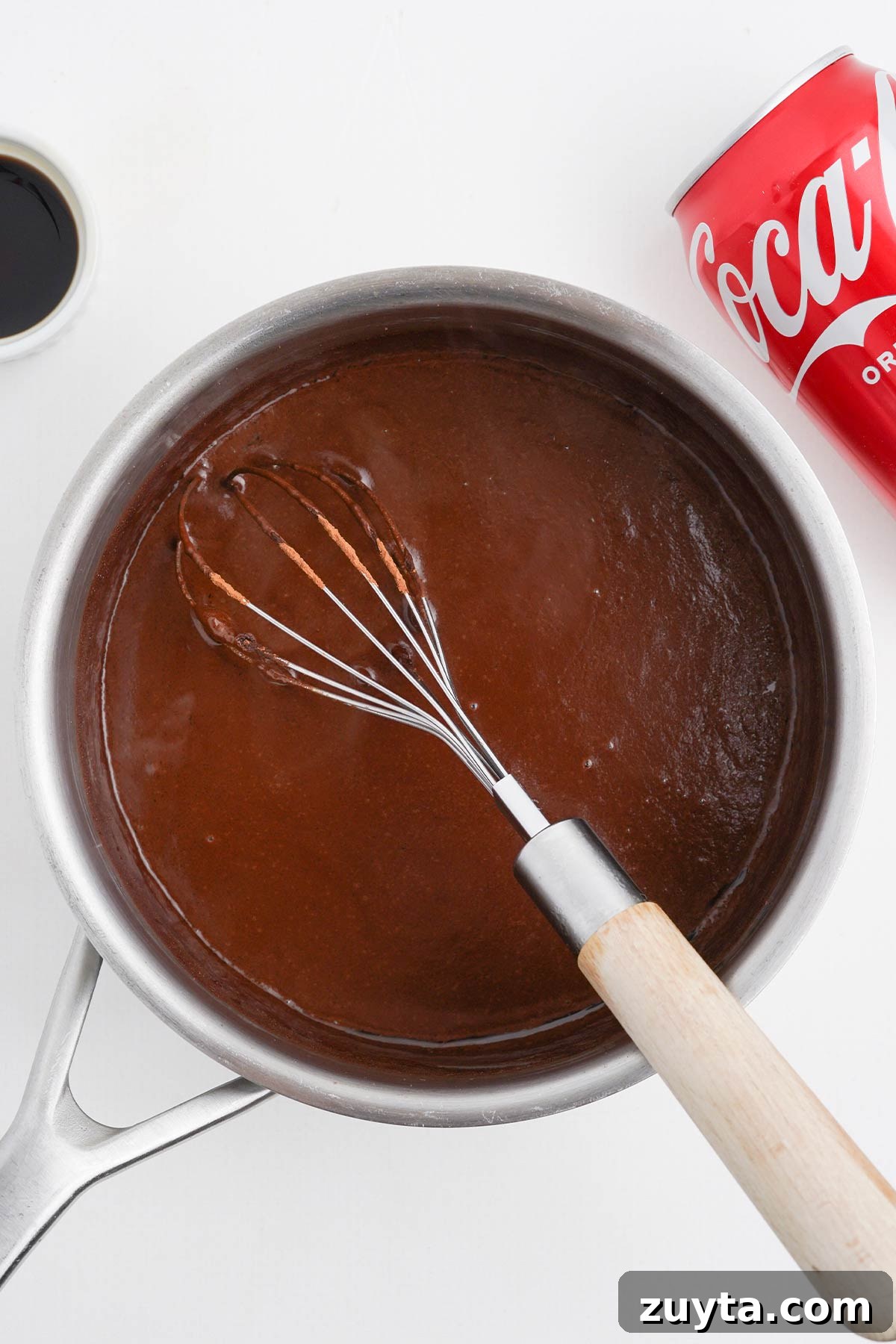 Copycat Cracker Barrel Coca-Cola Cake Recipe 7 Chocolate icing in a saucepan to make coca cola cake.