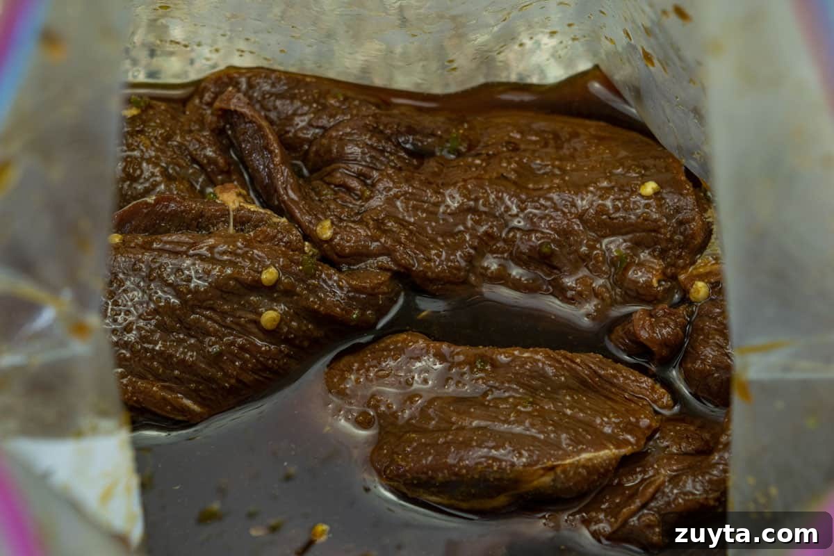 Homemade Asian-Spiced Venison Jerky Recipe 4 venison jerky marinating in ziplock bag