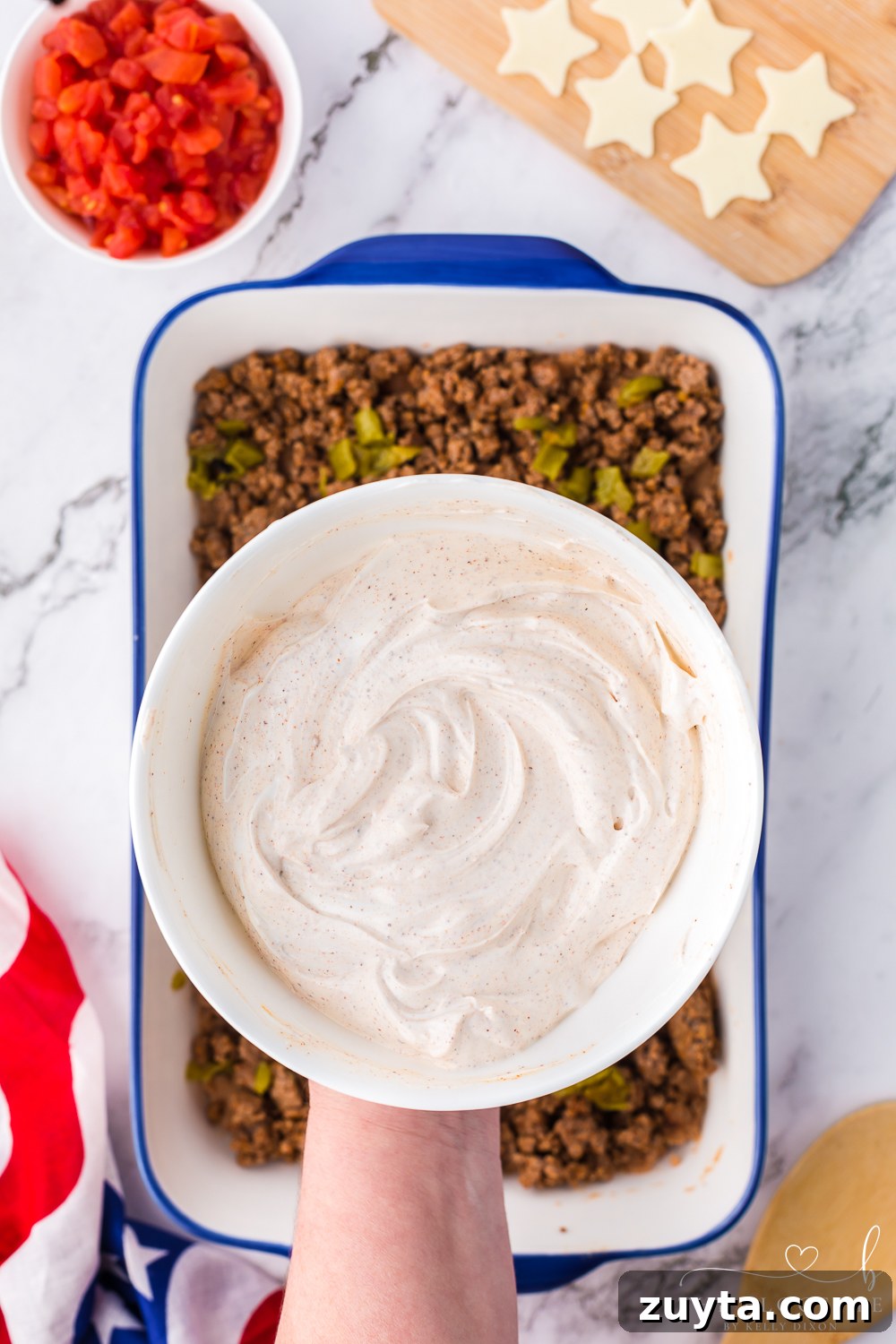 Patriotic American Flag 7 Layer Dip for Fourth of July 7 Seasoned sour cream sauce
