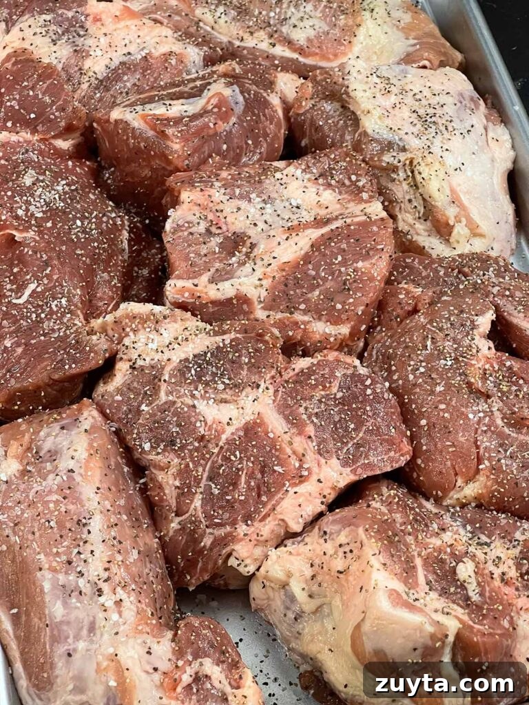 Slow-Braised Apple Cider Pork Shoulder 3 Seasoned pork shoulder, cut up in large pieces.