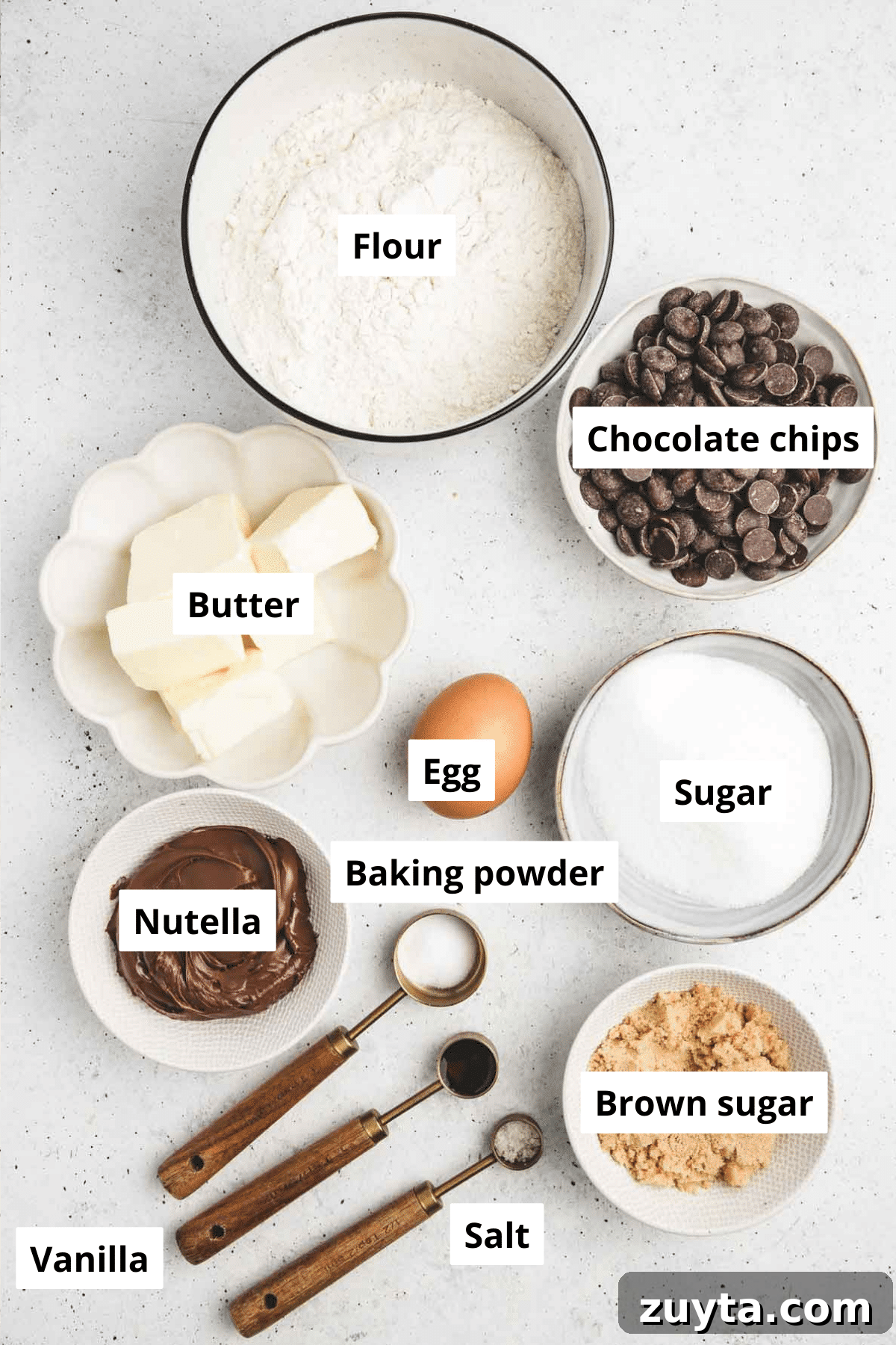 Bowls with ingredients for Nutella stuffed chocolate chip cookies