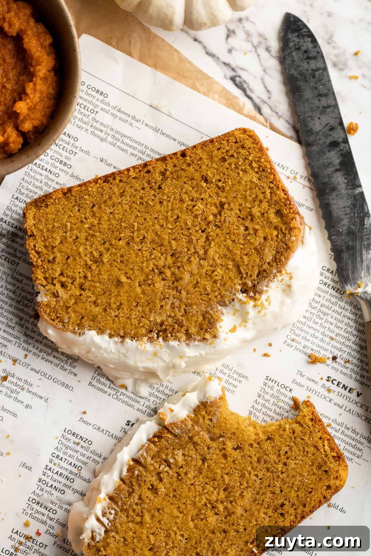 Slices of pumpkin bread with cream cheese frosting Slices of pumpkin bread with cream cheese frosting