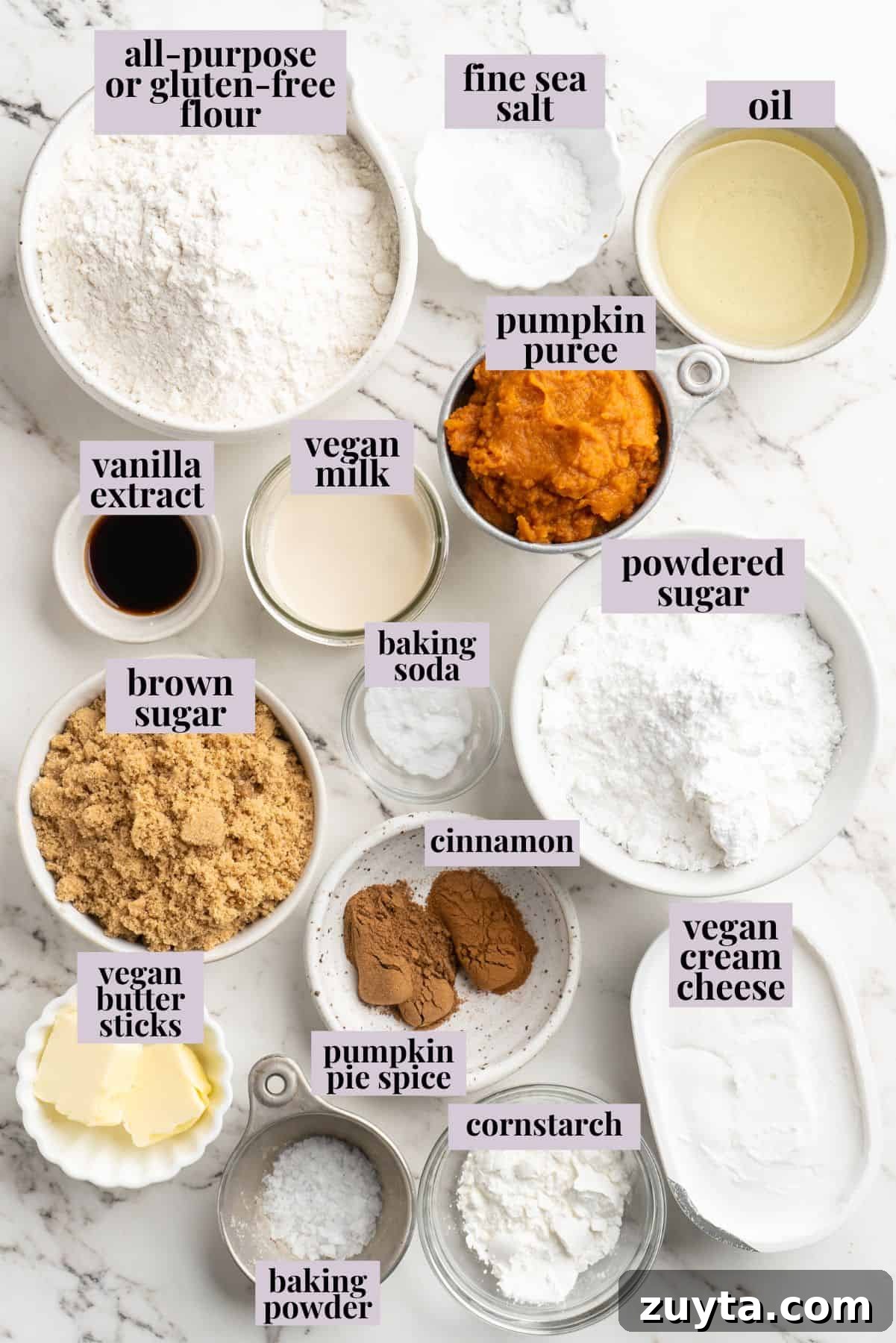 Vegan pumpkin bread with cream cheese frosting is moist, full of cozy spices and the frosting takes it over the top. So easy to make too! Overhead view of labeled ingredients for pumpkin bread with cream cheese frosting